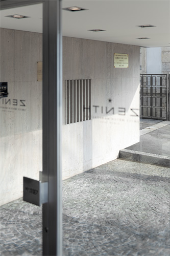 A view from inside the Zenith headquarters building on Georges Favre-Jacot's tomb (marked with a plaque)