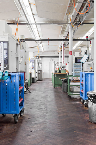 Ingredients of a real manufacture: a warm oily smell in the air and a time-honoured wooden floor